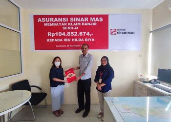 ASM Bayar Klaim Banjir Nasabah di Gorontalo Sebesar Rp 104 Juta